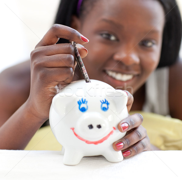 Mosolyog tinilány pénz persely fehér kéz Stock fotó © wavebreak_media