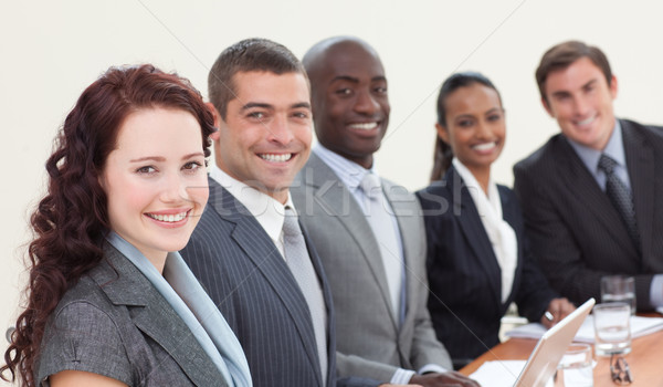 Ludzi biznesu posiedzenia spotkanie uśmiechnięty kamery komputera Zdjęcia stock © wavebreak_media