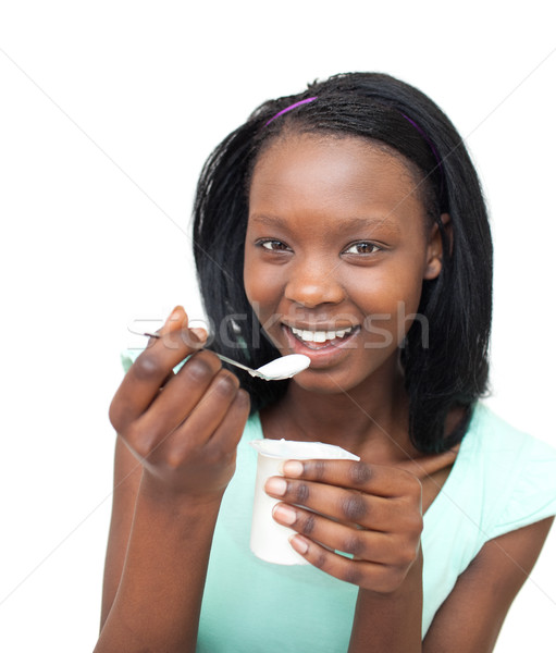 Alegre mulher jovem alimentação iogurte branco comida Foto stock © wavebreak_media