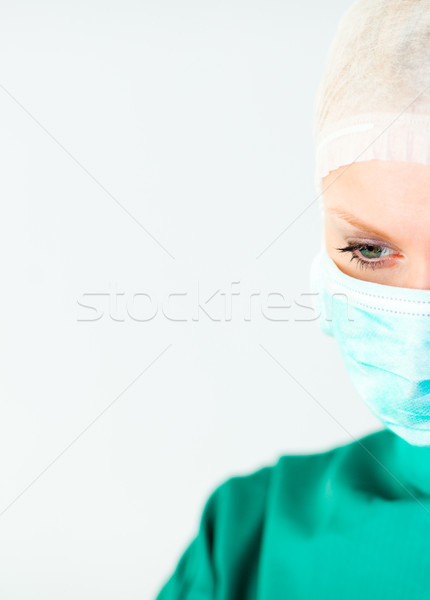 Stockfoto: Vrouwelijke · chirurg · masker · gezicht · arts · gelukkig