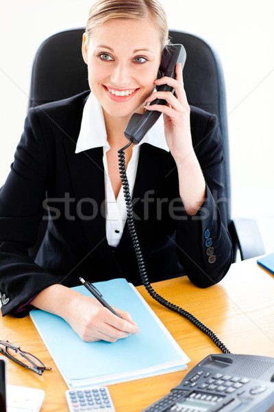 üzletasszony beszél telefon ír irodai asztal üzlet Stock fotó © wavebreak_media