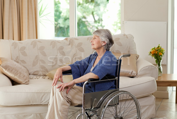 Retired woman in her wheelchair Stock photo © wavebreak_media