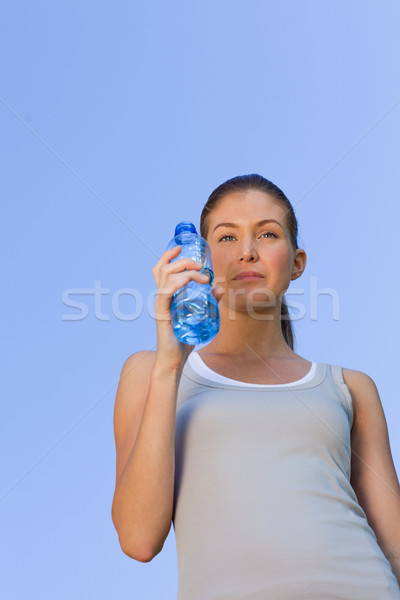 Young woman drinking water Stock photo © wavebreak_media