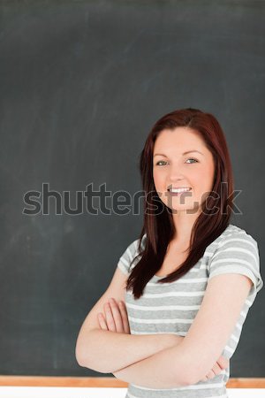 ストックフォト: 肖像 · かわいい · 女性 · 立って · 黒板 · 教室