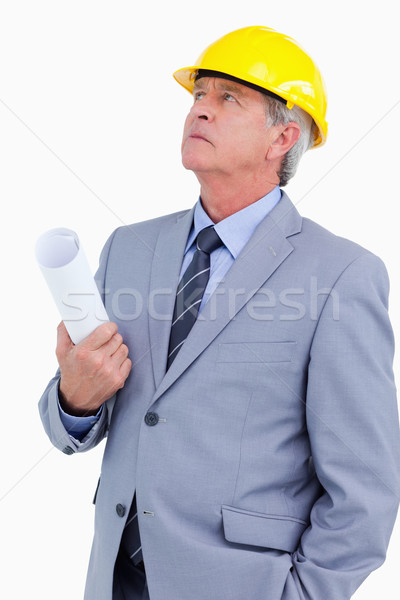 Close up of mature architect taking a close look against a white background Stock photo © wavebreak_media