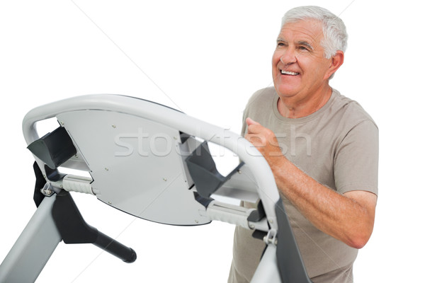 Boldog idős férfi fut futópad fehér Stock fotó © wavebreak_media
