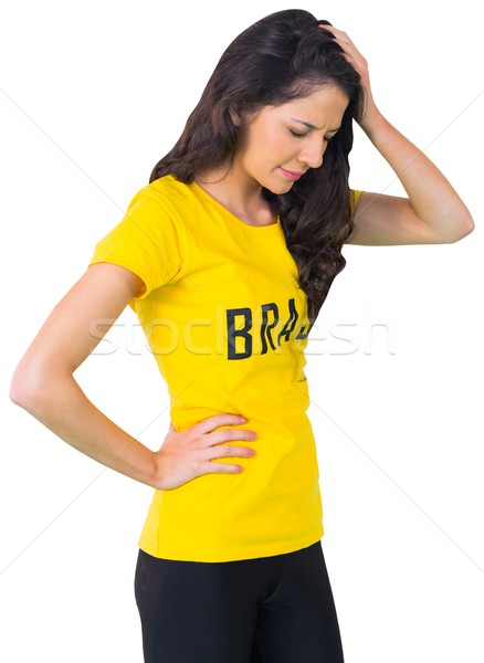 Disappointed football fan in brasil tshirt Stock photo © wavebreak_media