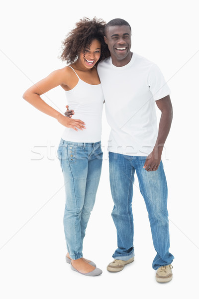 привлекательный пару согласование одежды улыбаясь камеры Сток-фото © wavebreak_media