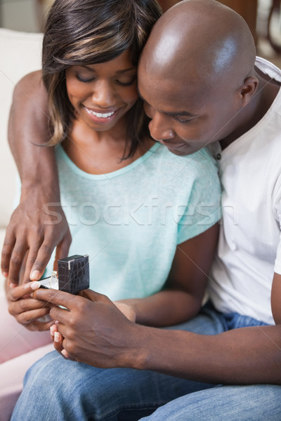 Stock photo: Man surprising his girlfriend with a proposal