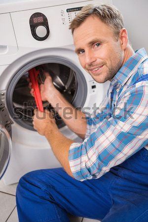 Plumber fixing sink with screwdriver Stock photo © wavebreak_media