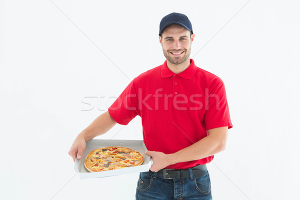Boldog futár tart friss pizza portré Stock fotó © wavebreak_media