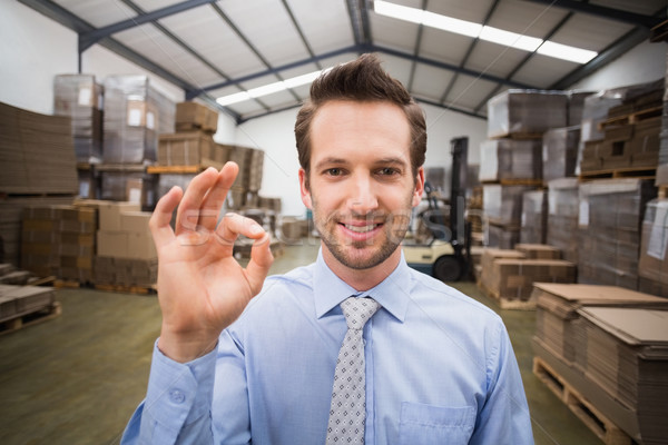 Happy warehouse manager making okay gesture Stock photo © wavebreak_media