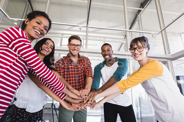 Portrait souriant gens d'affaires mains permanent [[stock_photo]] © wavebreak_media