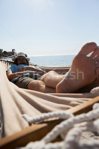 Stock photo: Man relaxing in hammock