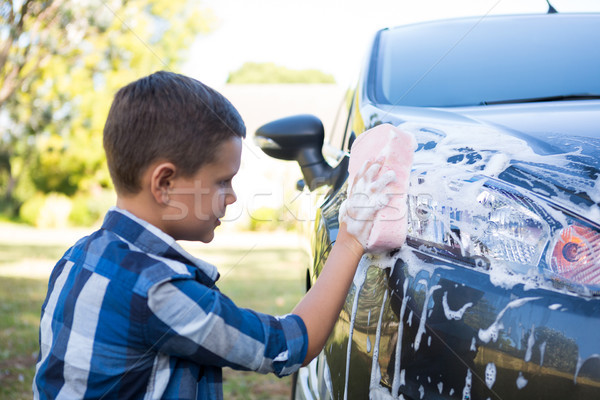 Teenage boy washing a car Stock photo © wavebreak_media