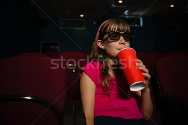 Lány visel 3d szemüveg ital film színház Stock fotó © wavebreak_media