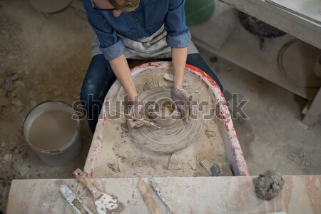 Overhead of female potter molding a clay Stock photo © wavebreak_media
