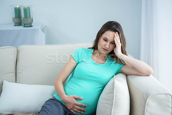Pregnant woman with headache Stock photo © wavebreak_media