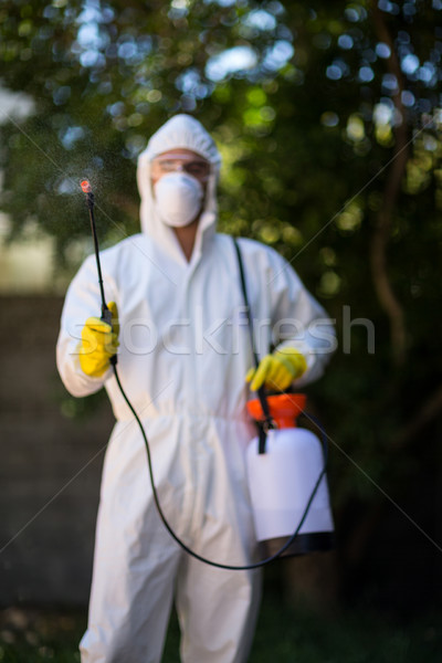 Front view of worker spraying chemical Stock photo © wavebreak_media