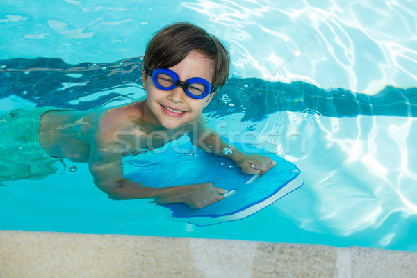 Zâmbitor băiat piscină fericit piscină frumos Imagine de stoc © wavebreak_media