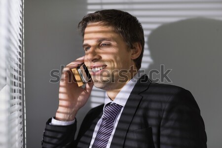 Androgynous man holding wine glass against black background Stock photo © wavebreak_media