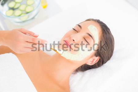 Cute kobieta proszek twarz biały strony Zdjęcia stock © wavebreak_media