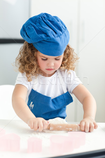 Little girl baking in the kitchen at home Stock photo © wavebreak_media