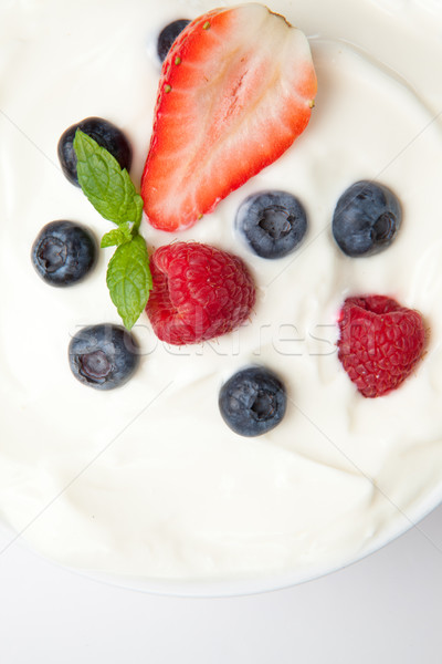 Berries in a white cream Stock photo © wavebreak_media
