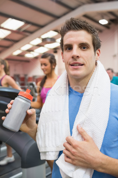 Homme exercice gymnase eau heureux [[stock_photo]] © wavebreak_media