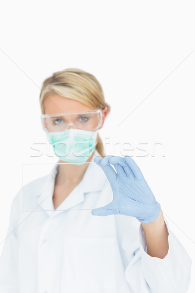 Female surgeon studying clear pane Stock photo © wavebreak_media