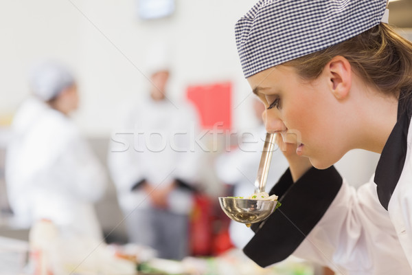 Chef smelling soup in kitchen Stock photo © wavebreak_media