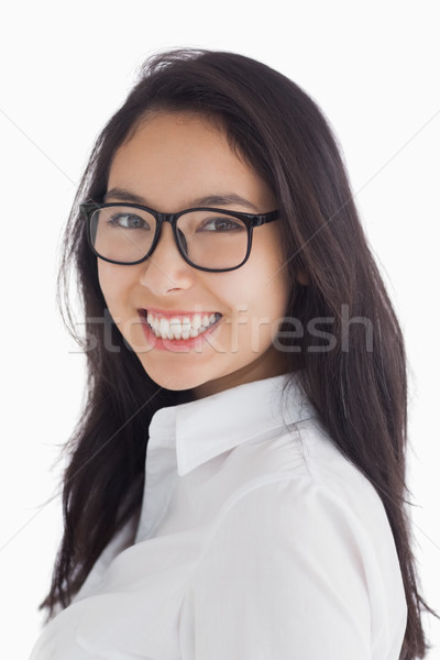 Sonriendo morena gafas femenino camisa Foto stock © wavebreak_media