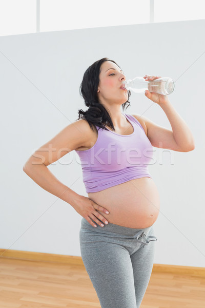 Hamile kadın içme şişe su uygunluk stüdyo Stok fotoğraf © wavebreak_media