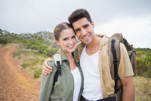 Caminhadas casal em pé montanha terreno retrato Foto stock © wavebreak_media