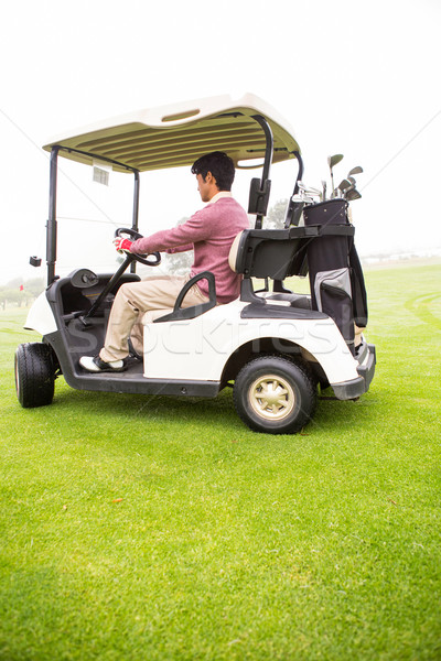 Golfista guida golf campo da golf nubi uomo Foto d'archivio © wavebreak_media