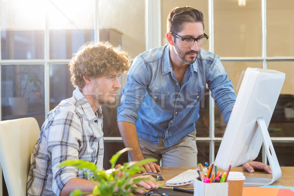 Stock photo: Concentrated business team working on computer