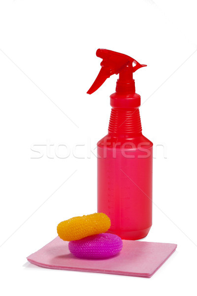 Spray bottle, scrubbers and cleaning pad on white background Stock photo © wavebreak_media