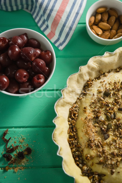 Cropped image of tart with olives and almonds Stock photo © wavebreak_media