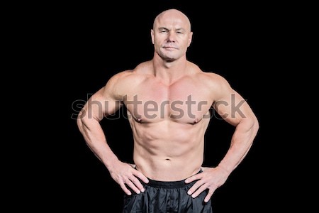 Confident shirtless man holding nutritional supplement Stock photo © wavebreak_media