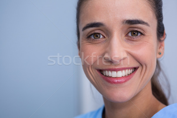 Beautiful woman smiling at dentist clinic Stock photo © wavebreak_media