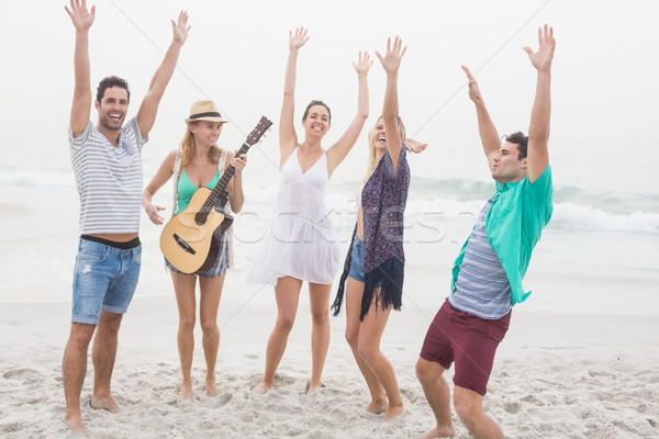 Csoport barátok játszik gitár tánc tengerpart Stock fotó © wavebreak_media
