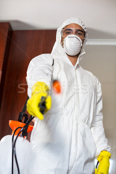 Low angle portrait of manual worker with pest sprayer Stock photo © wavebreak_media