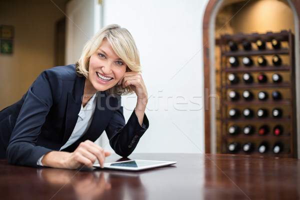 Businesswoman using digital tablet in a restaurant Stock photo © wavebreak_media