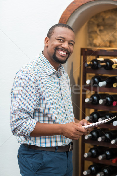 Happy man using digital tablet in the restaurant Stock photo © wavebreak_media