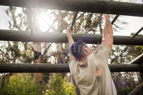 Soldier climbing monkey bars Stock photo © wavebreak_media