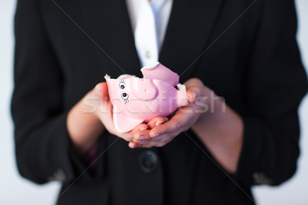 Foto stock: Mulher · de · negócios · quebrado · piggy · bank · jovem · dinheiro