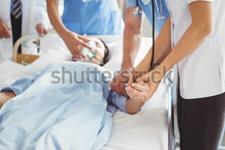 Medical partners trying to reanimate a patient  Stock photo © wavebreak_media