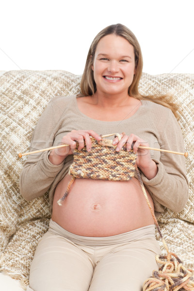 Alegre mujer embarazada sesión sofá casa Foto stock © wavebreak_media