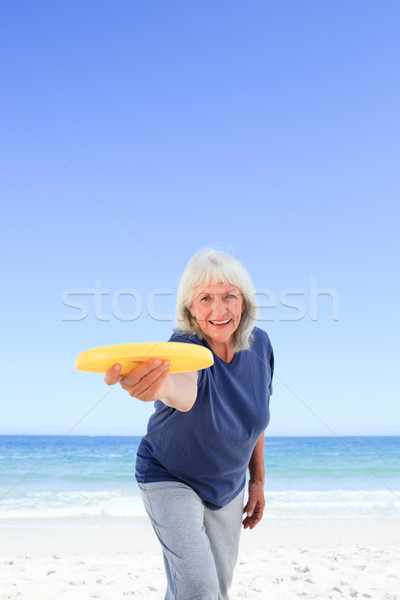 Spielen Frau Strand Meer Sommer Stock foto © wavebreak_media