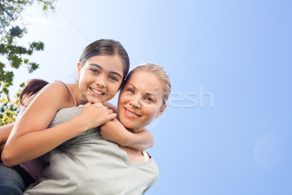 Mother and her daughter laughting in the park Stock photo © wavebreak_media